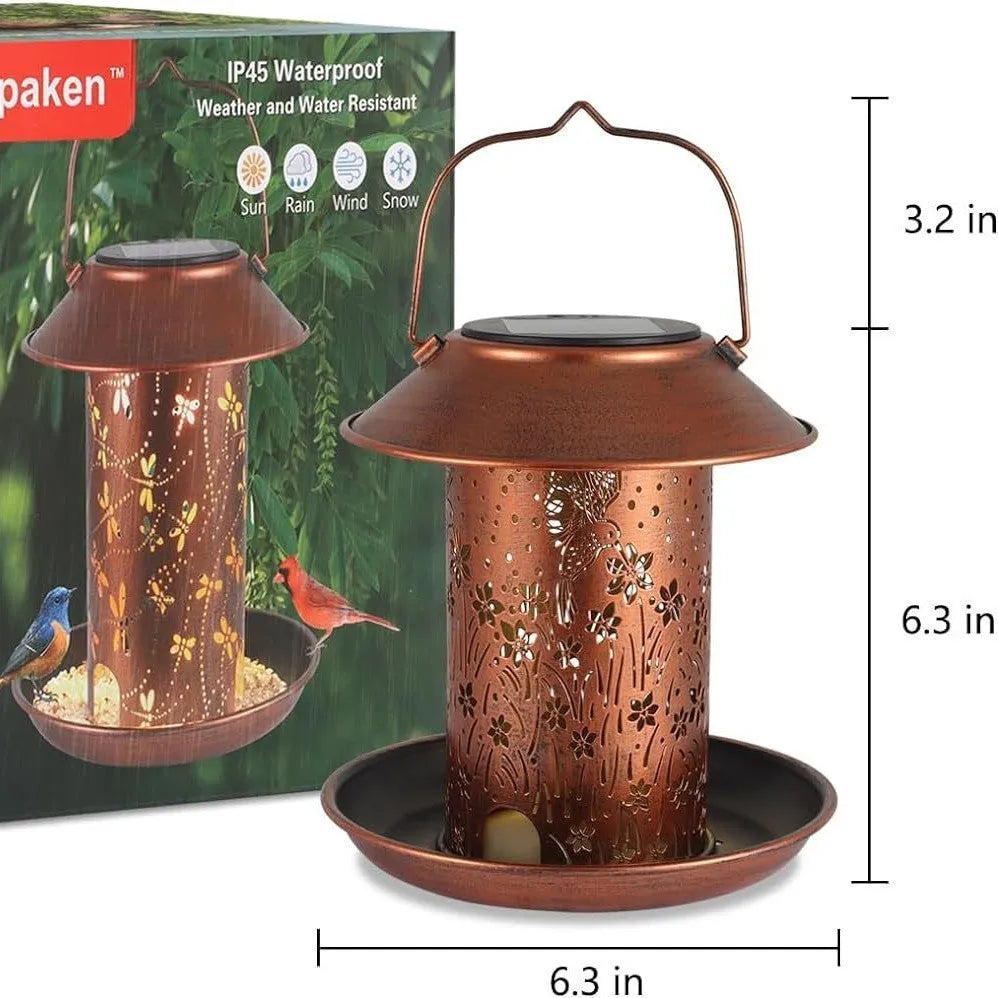 Solar powered bird feeder with hummingbird pattern and LED lights for outdoor garden decoration