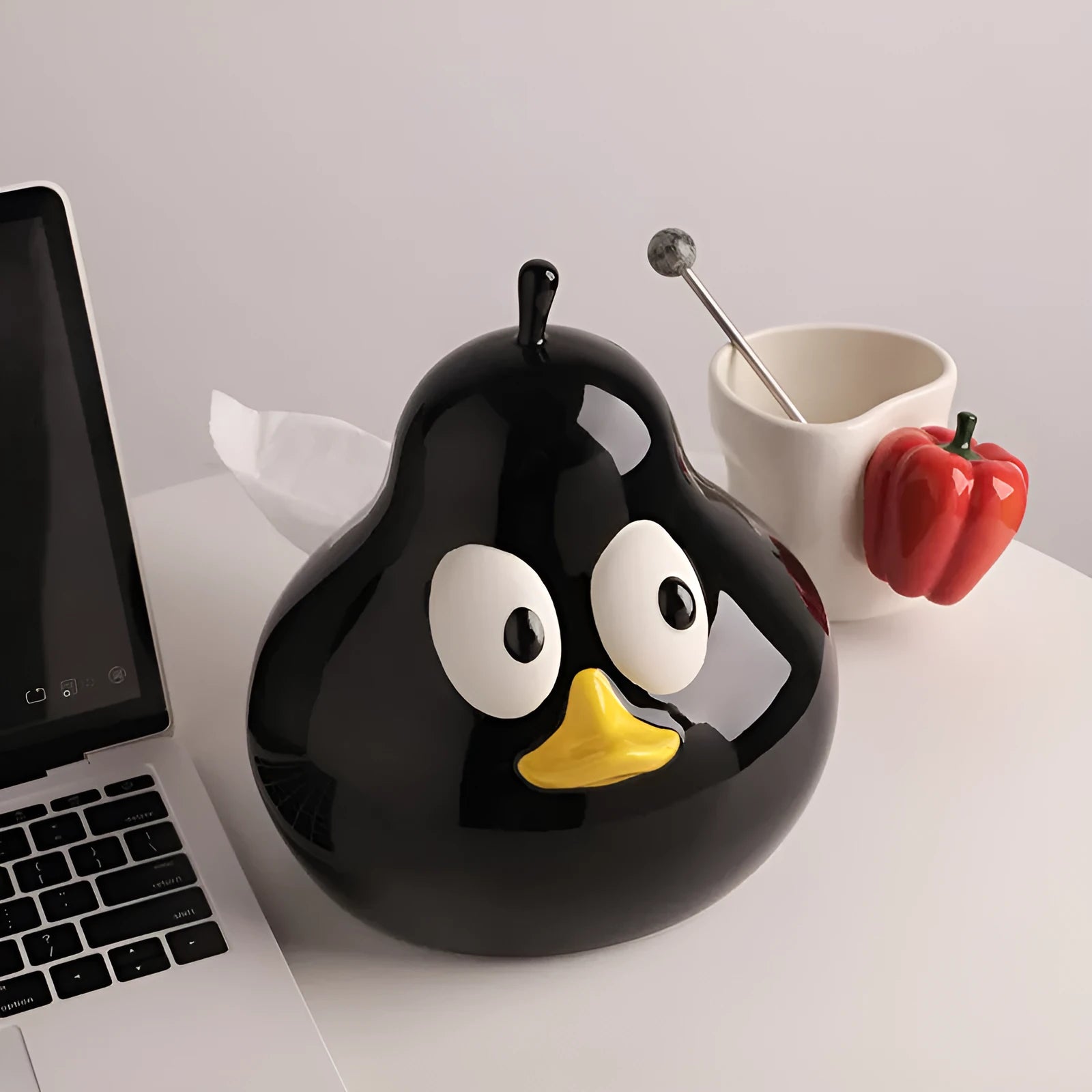 Ceramic pear-shaped tissue box in black or green for living room or desktop use