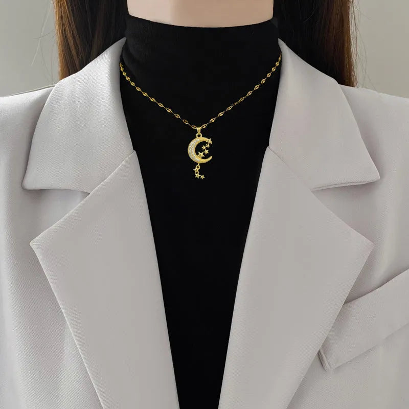 Moon pendant necklace with geometric tassel design and full diamond setting