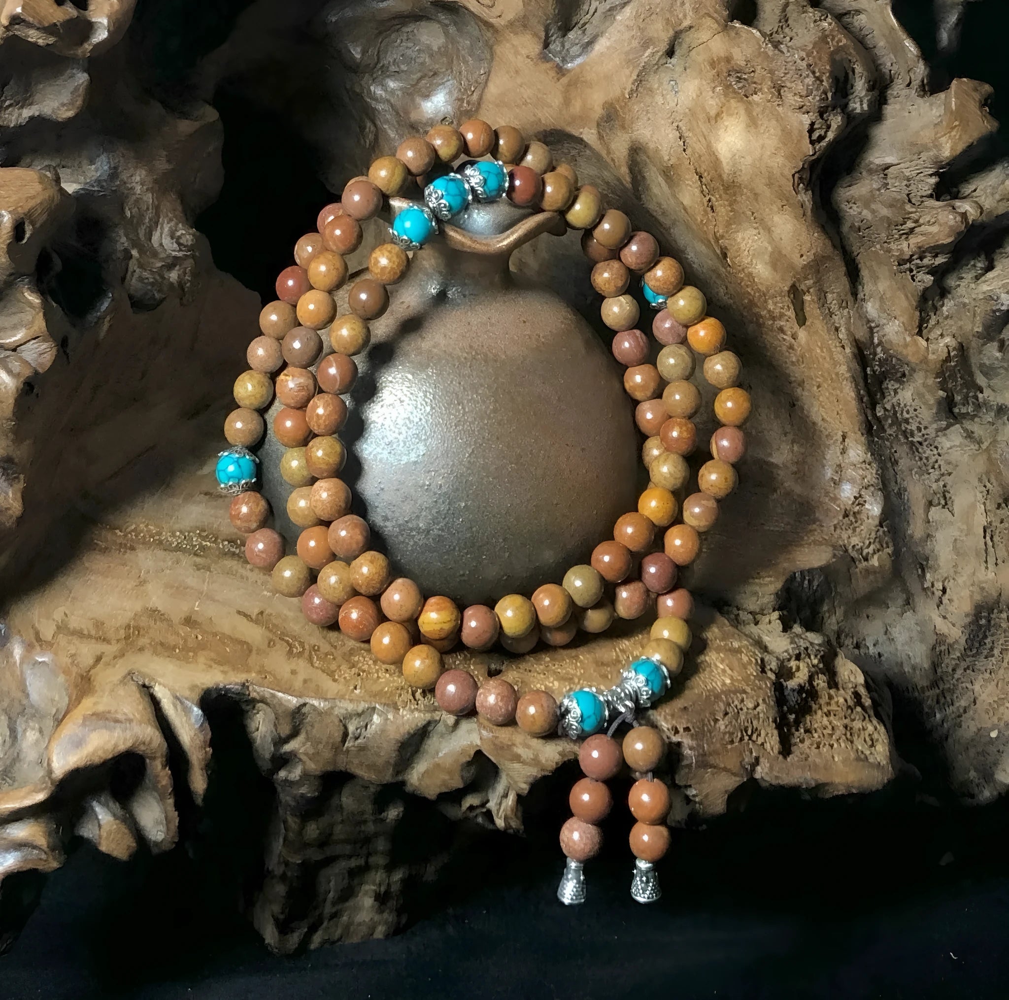 Stone bead bracelet with 108 geometric beads measuring 5-6mm in diameter