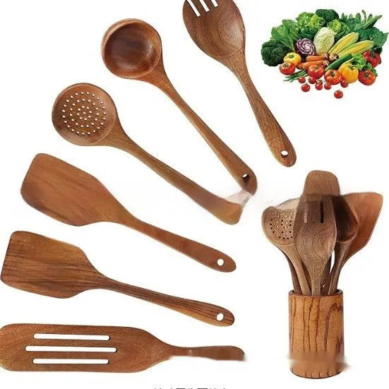 Wooden 7-piece kitchen utensil set with spoons and spatula on kitchen counter