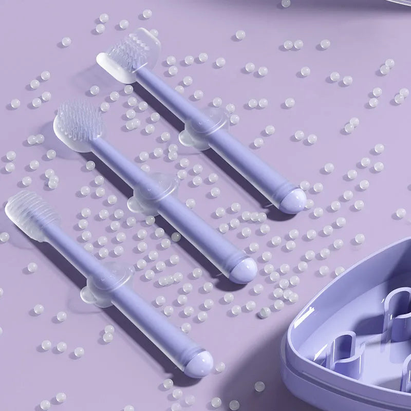 Soft silicone pet toothbrush for dogs and cats in blue, green, and purple colours for cleaning teeth and reducing bad breath.