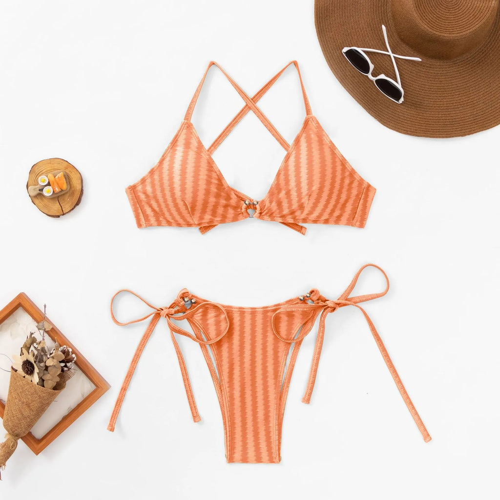 Women's red lace-up front bikini with quick-drying nylon fabric and split style briefs.