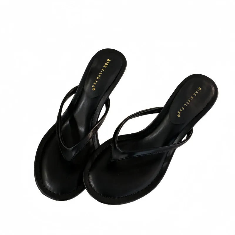 Women's stiletto flip-flop sandals in black or camel with round toe and open-toe design