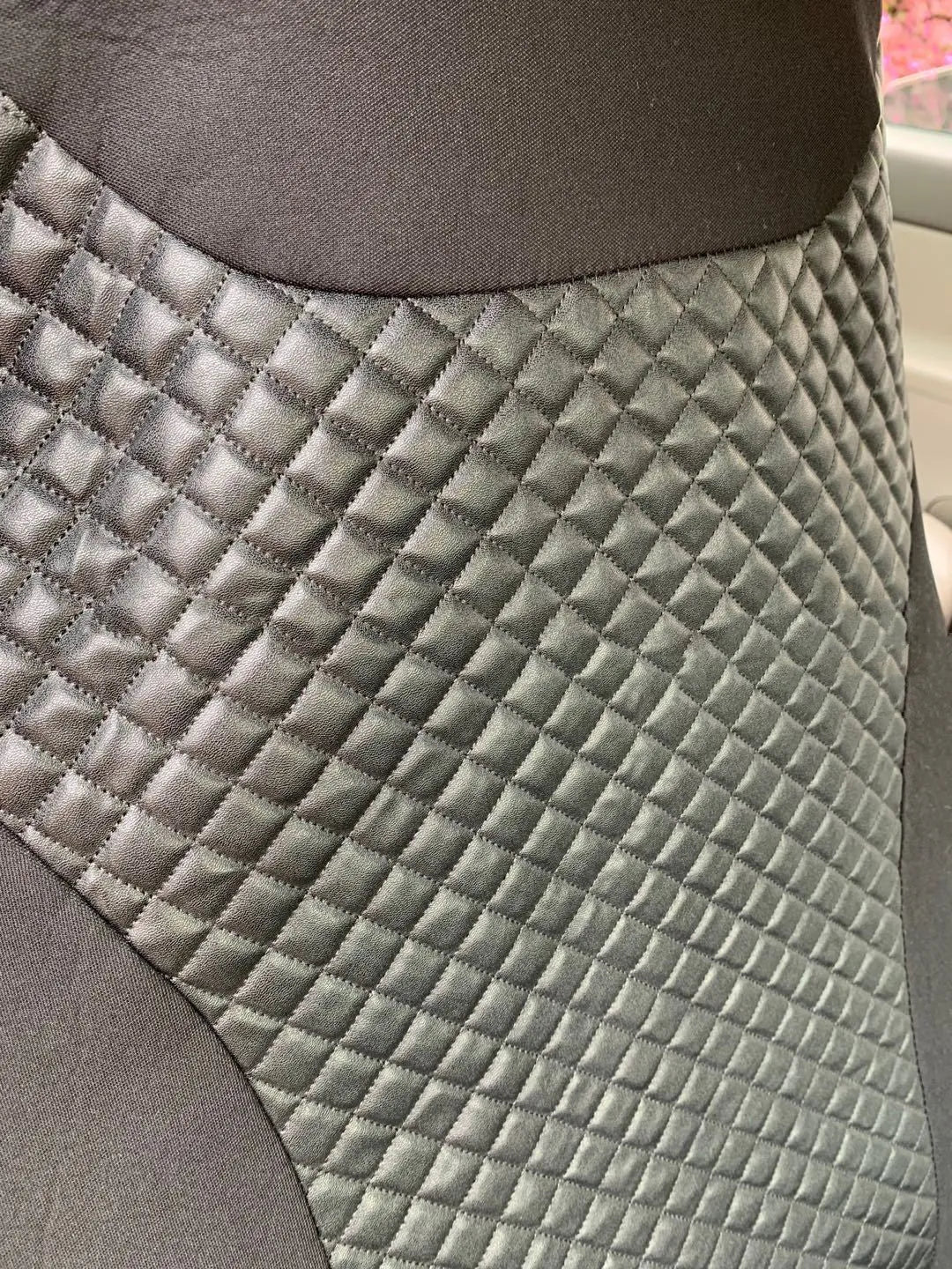 Black quilted automotive seat cover with PU polyester fabric and plastic hooks for universal car seat protection