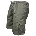 Man wearing khaki loose-fit cotton shorts with a drawstring waist and multiple pockets.