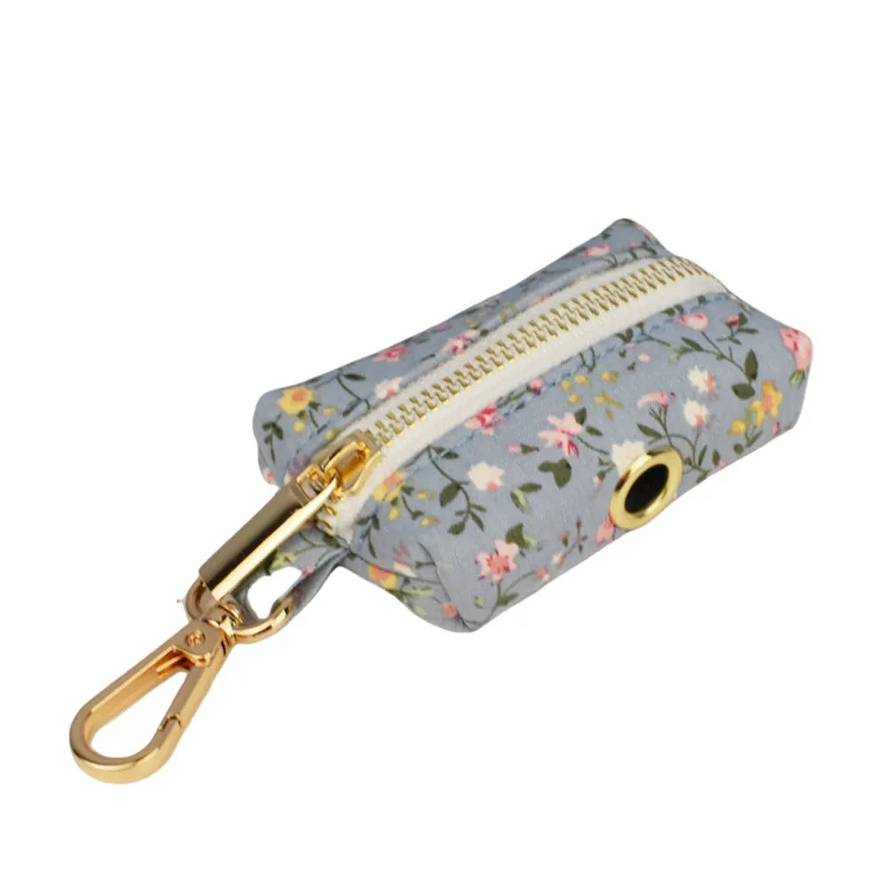Floral dog collar set with matching leash, vest, and bow accessories in polyester cotton cloth