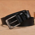 Men's casual square head pin buckle belt in black on jeans.