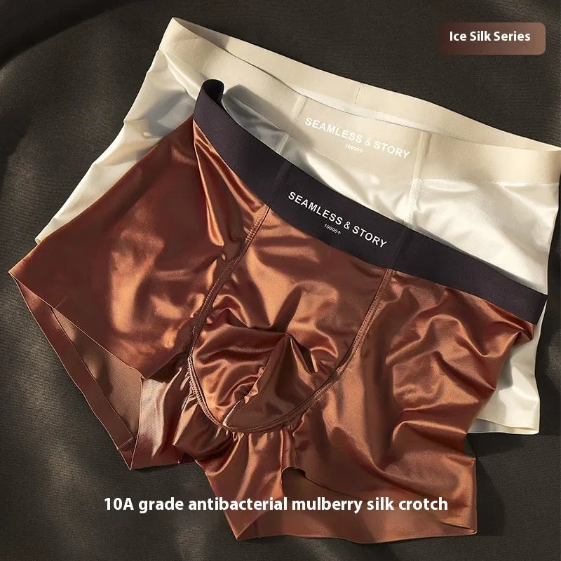 Men's solid colour Ice Silk boxer shorts with mid waist, shown in coffee, light grey, white, and blue.