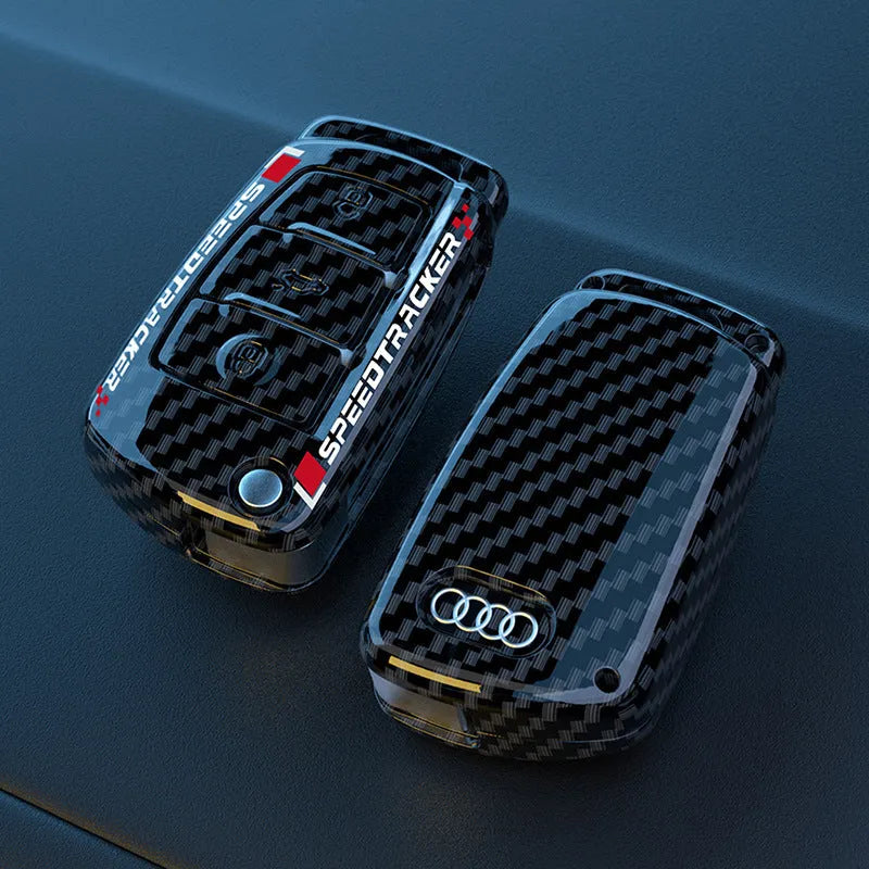 Carbon fibre pattern car key cover in black and white options with minimalist design