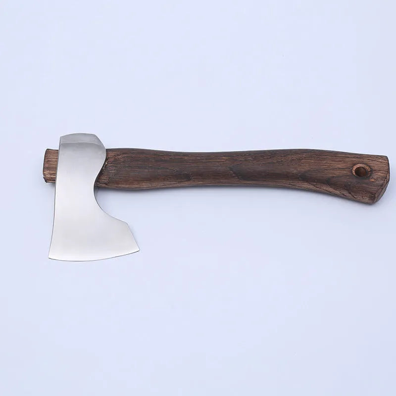 Camping axe with a high carbon steel head and wooden handle on a neutral background.