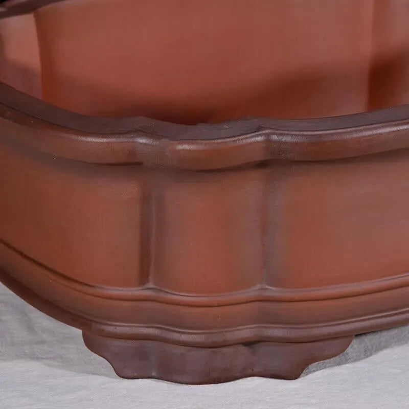 Large antique-finished Chinese purple clay flowerpot measuring 71cm long
