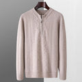 Men's grey diamond pattern wool half-zip sweater on a hanger, loose fit long sleeve.