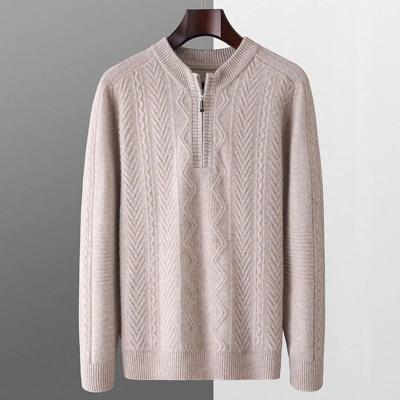 Men's grey diamond pattern wool half-zip sweater on a hanger, loose fit long sleeve.