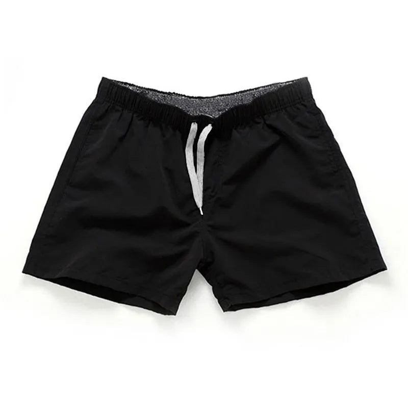 Men's straight leg beach shorts in polyester fabric for surfing and swimming