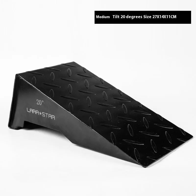 Black iron squat foot pad hard pull auxiliary force generator on gym floor