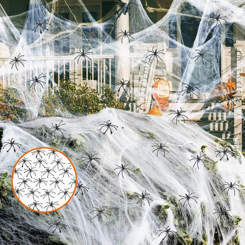 White cotton spider web Halloween decoration props draped across corner with multiple spiders