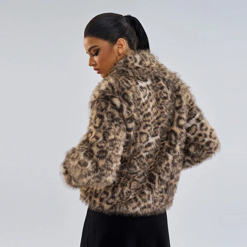 Women's leopard print polyester coat with a buckle detail on the lapel.