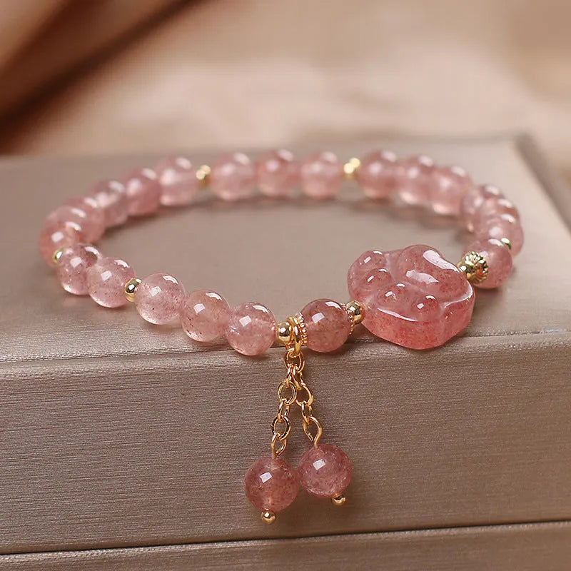 Women's double layer crystal bracelet with lucky cat charm and red cat's eye flowers design.