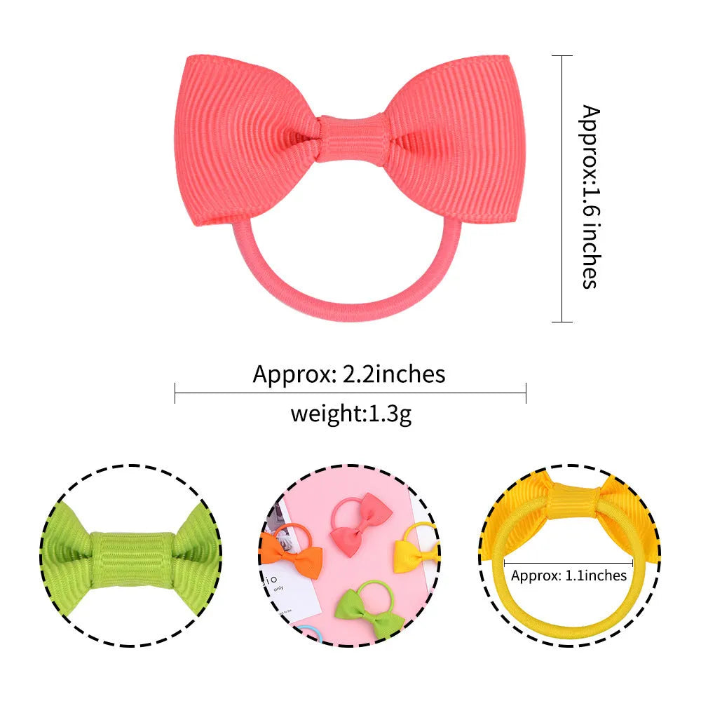 80 piece set of tiny multi-coloured grosgrain ribbon hair bows and matching soft elastic bands for babies and toddlers.