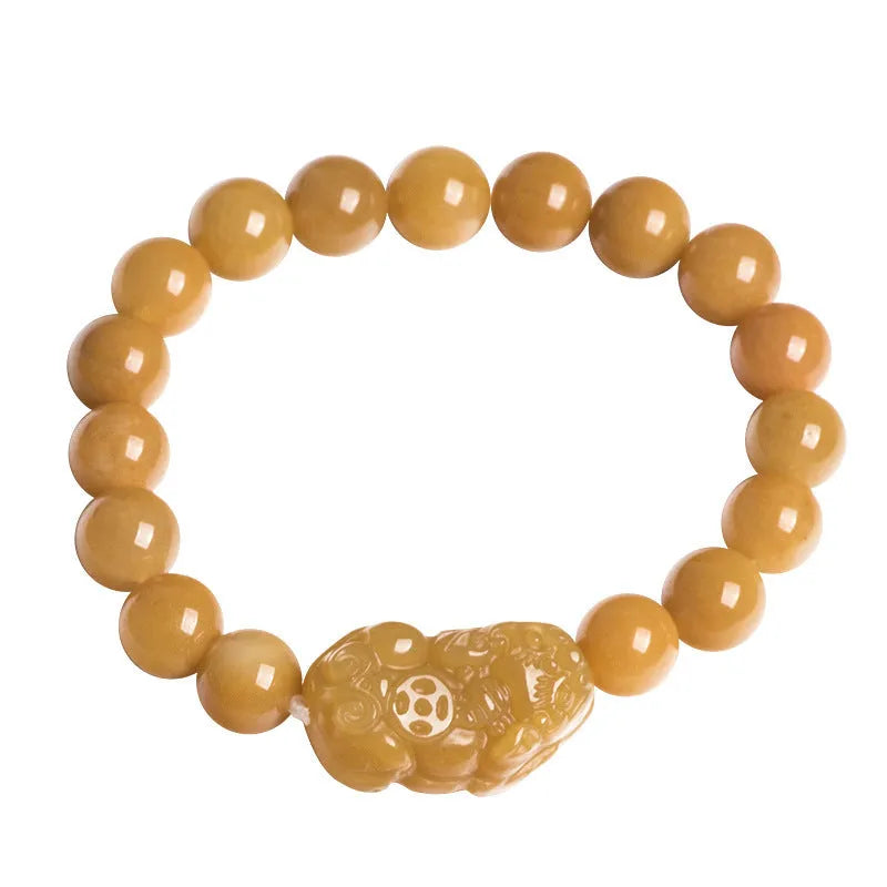 Hand-carved Jinsi Jade money bracelet with traditional coin pendant in golden-threaded stone