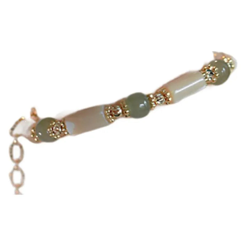 Handmade Hetian Jade white lip shell bracelet with round beads in simple geometric design