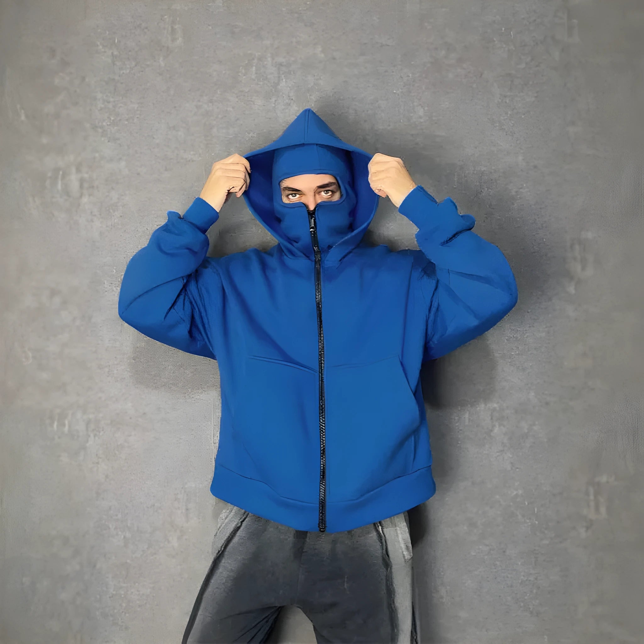 Men's solid colour loose polyester hoodie with double-layer masked hood and zip front, shown in black