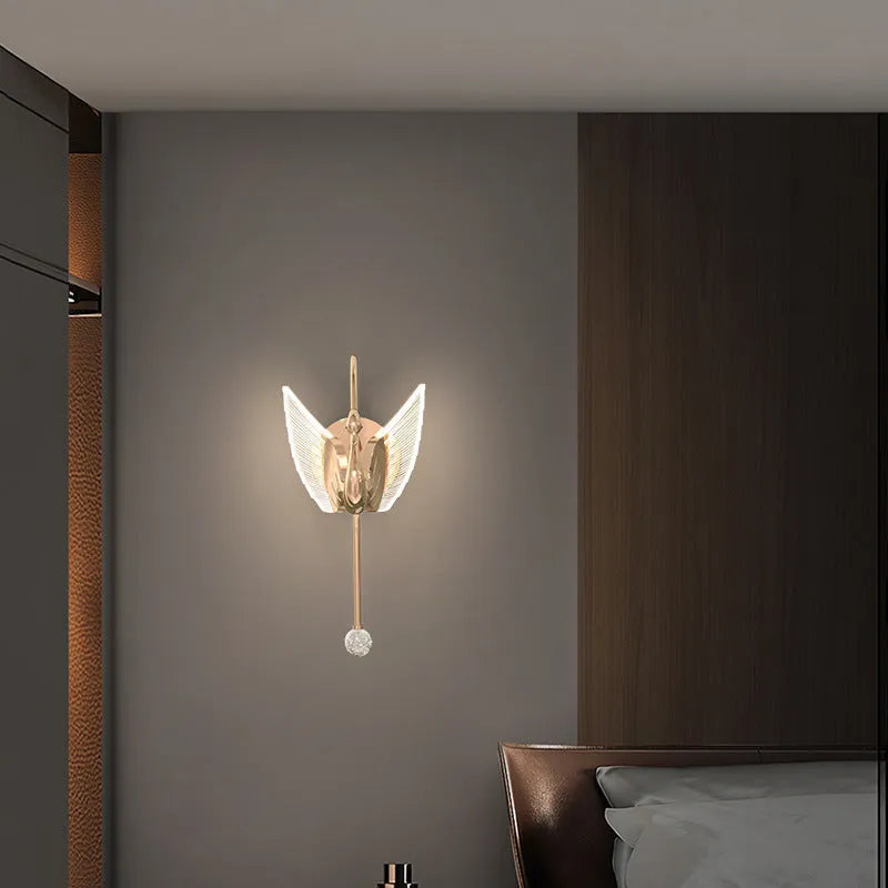 Gold swan-shaped LED wall lamp with acrylic shade for modern bedroom bedside lighting