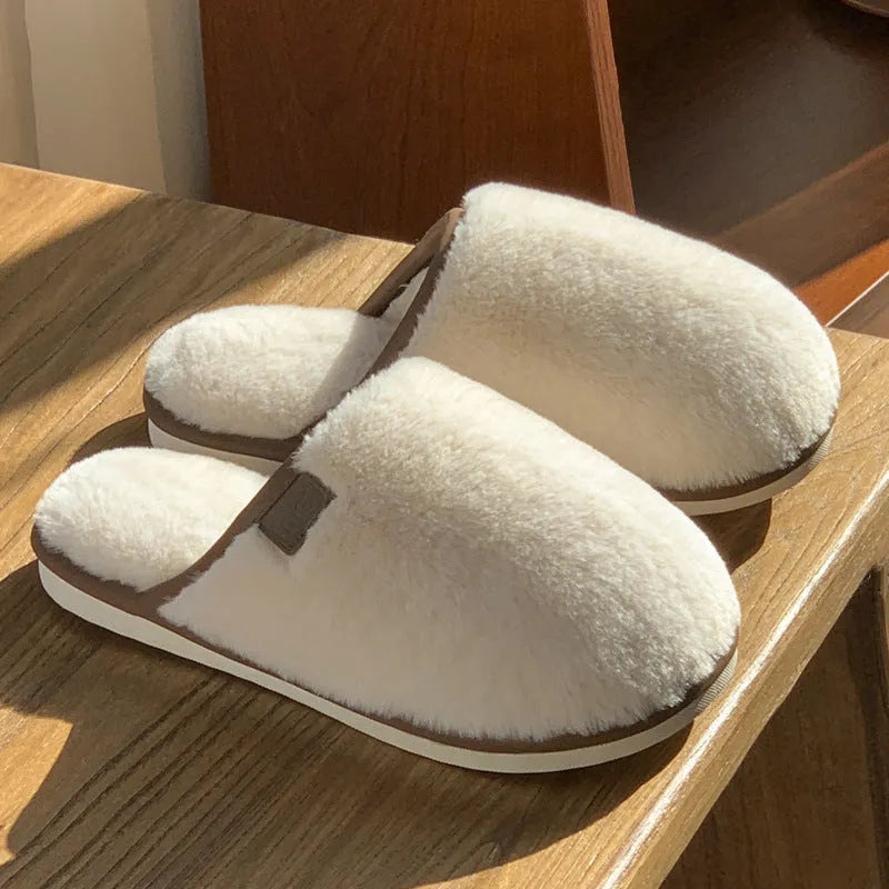 PVC plush winter slippers in a solid colour with a non-slip sole for indoor wear.
