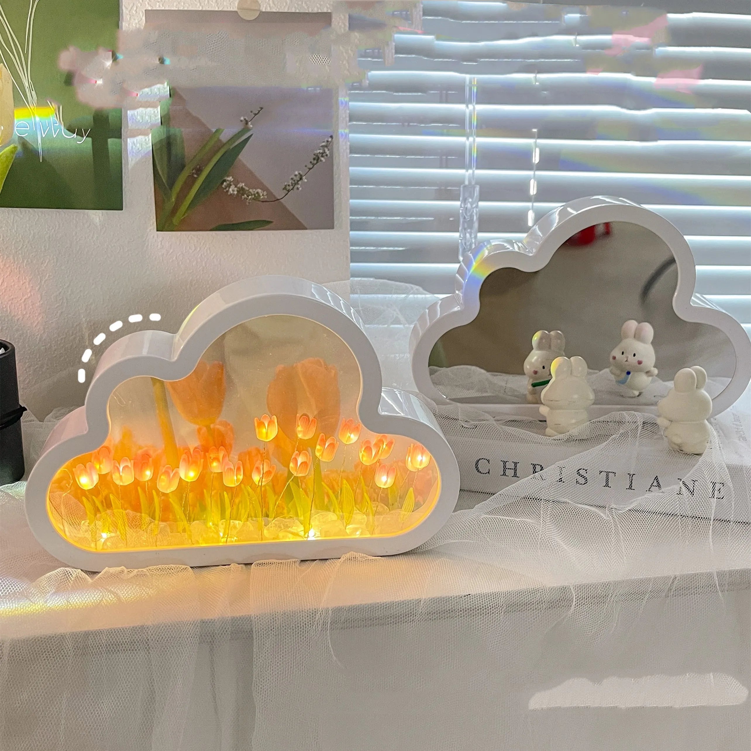 DIY tulip night lamp with mirror and LED light in pink colour on a desk