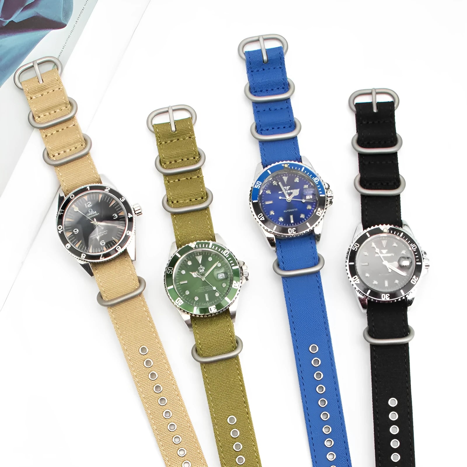 Canvas nylon thickened watch band with silver buckle in army green colour on a white background showing weave texture