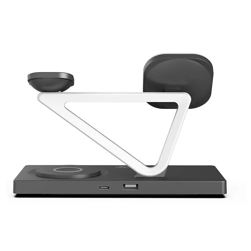 Black and white five-in-one wireless charging station with magnetic phone bracket, watch charger, and night light on wooden surface