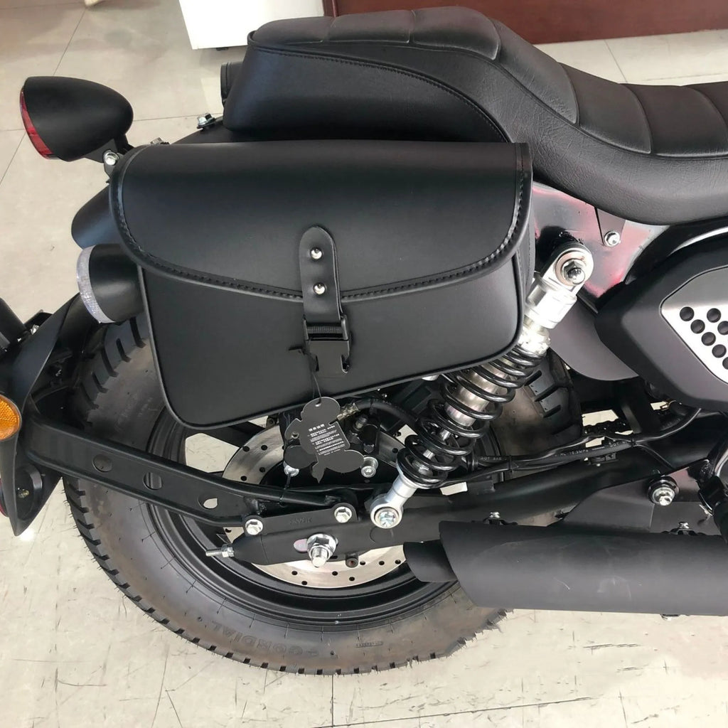 Black PU leather motorcycle swingarm saddlebag mounted on Harley-Davidson Sportster
