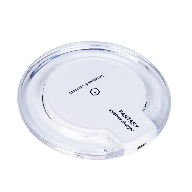 15W magnetic wireless charger with USB-C input, black finish, on a white desk, 84mm diameter disc with magnetic phone alignment