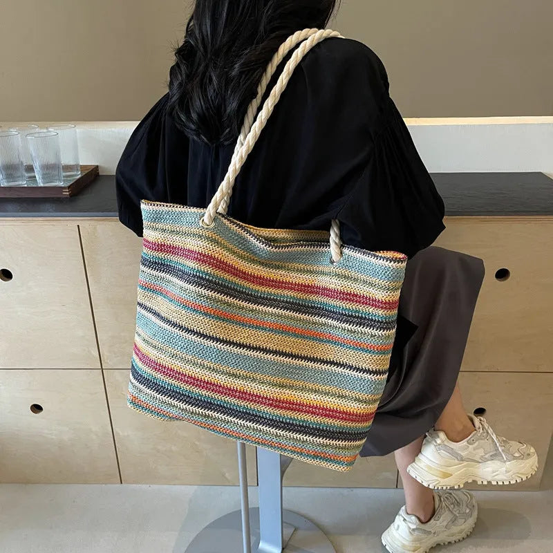 Blue straw woven nylon shoulder bag with polyester lining and single-shoulder strap