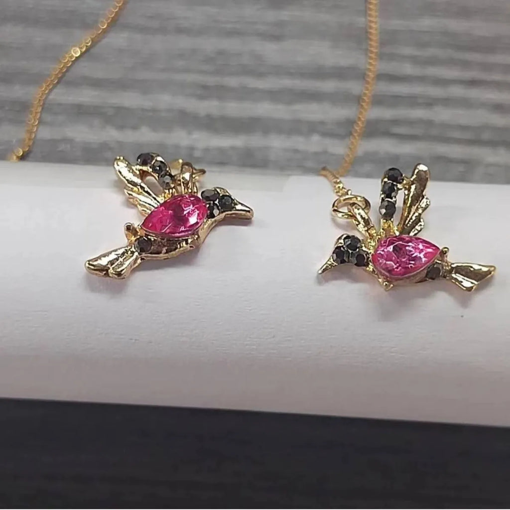 Long bird hanging earrings with mixed zirconium wings in blue, red, and red lvzuan colour options.
