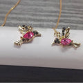 Long bird hanging earrings with mixed zirconium wings in blue, red, and red lvzuan colour options.