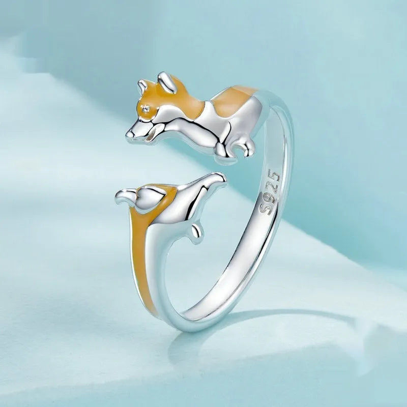 Silver cartoon corgi dog ring for women with electroplated finish.