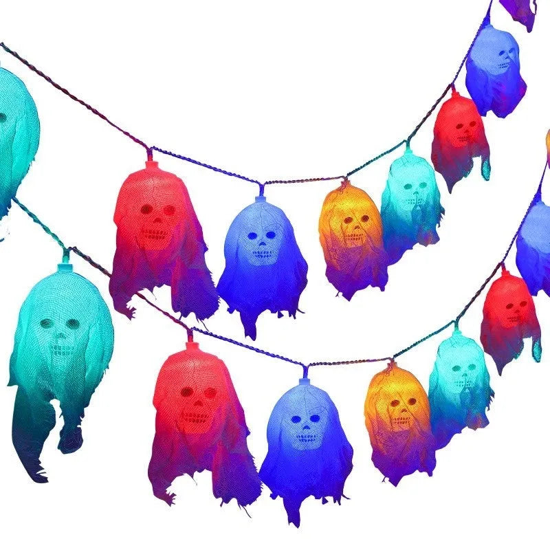 Halloween coloured battery-powered LED string lights showing plastic housing and multiple coloured light beads