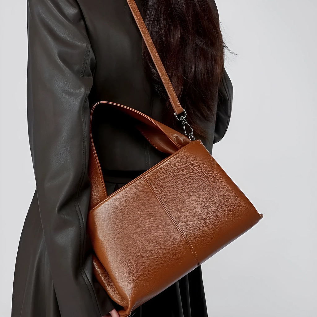 Women's apricot cowhide leather messenger bag with horizontal square shape and double shoulder straps