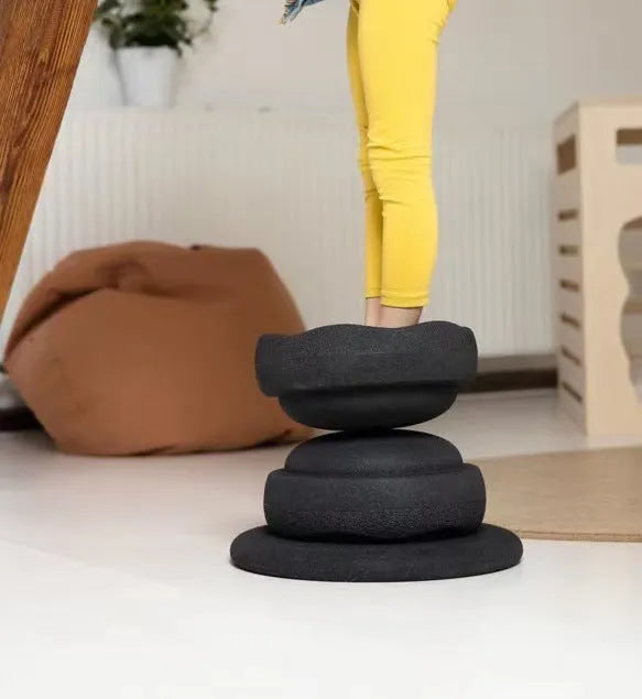 Plastic wood surf balance board for children aged 4-6 with mixed colour wood grain and black design.