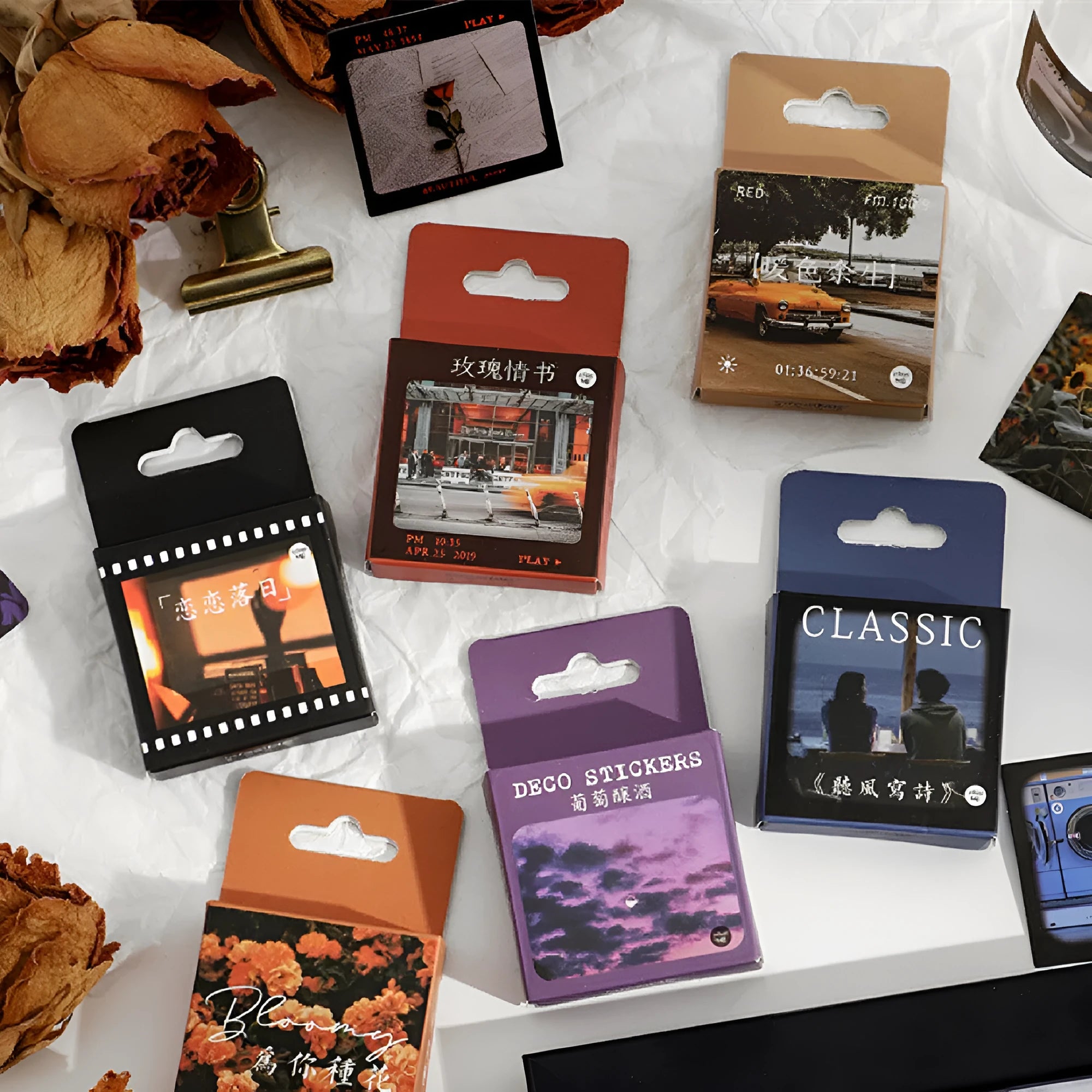 Box of Nordic style decorative stickers showing six colour variants with 44x44mm square size and non-drying adhesive