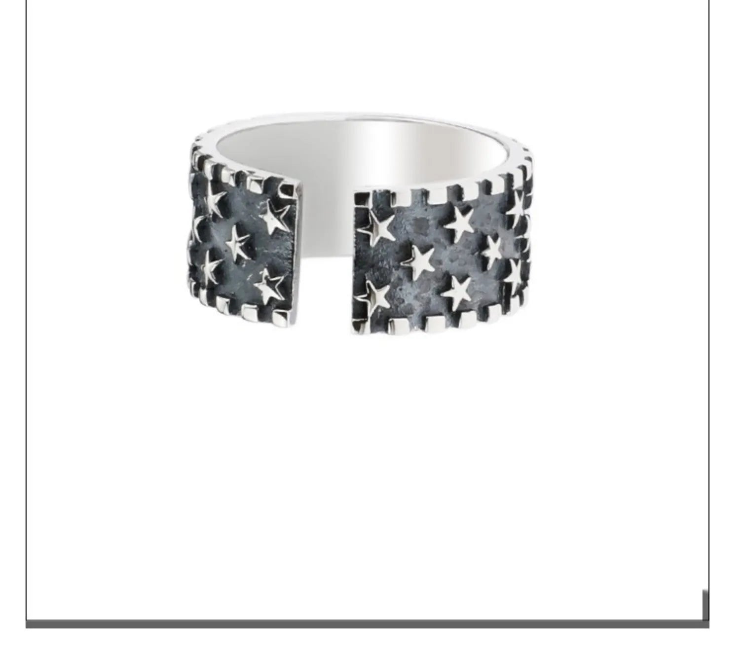 Adjustable sterling silver ring showing a geometric multi five pointed star pattern on the band.