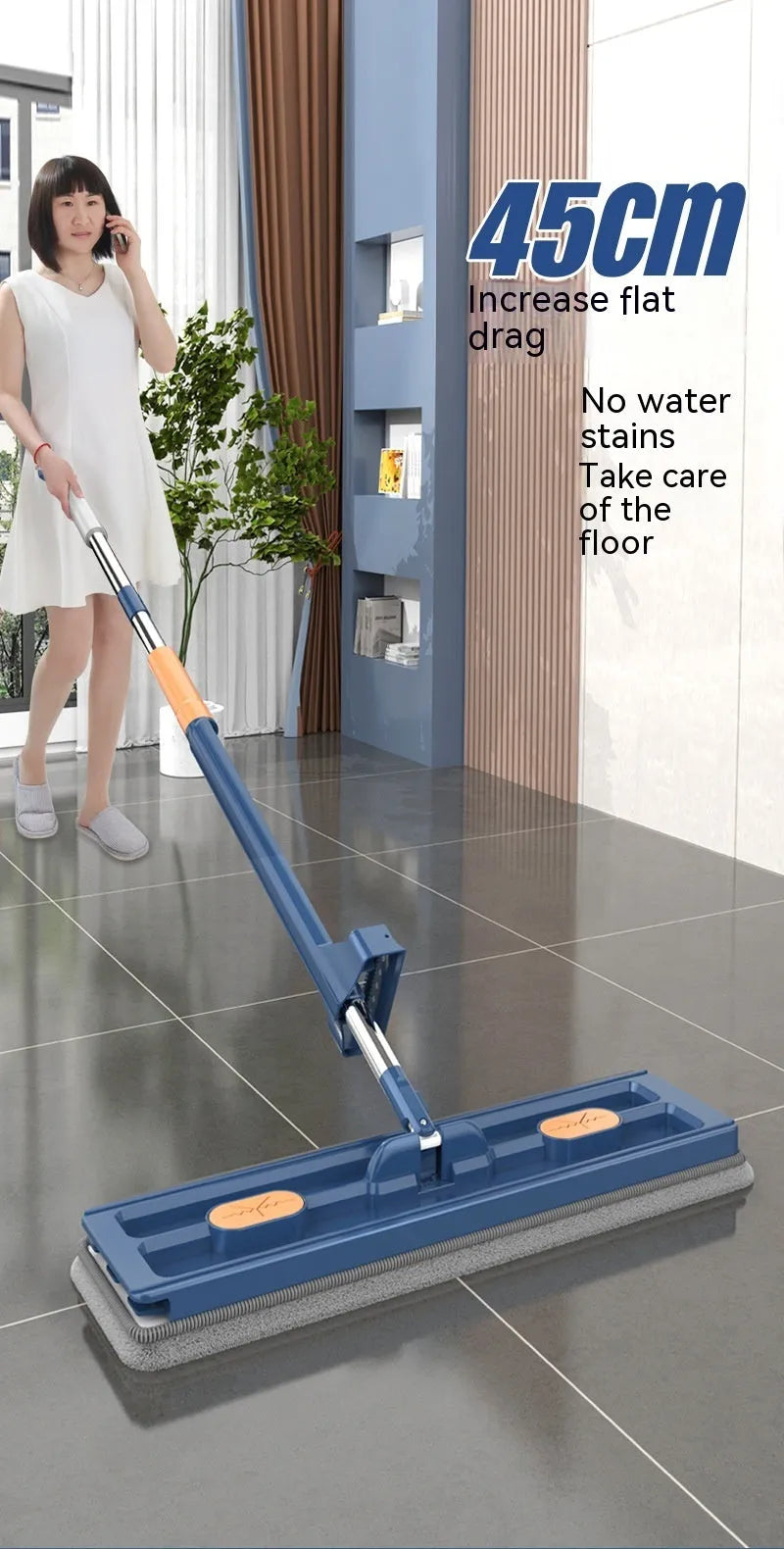 New style large flat mop with long stainless steel handle and blue cleaning cloth on a hard floor