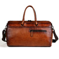 Genuine leather handmade retro travel bag in vintage brown with large capacity.