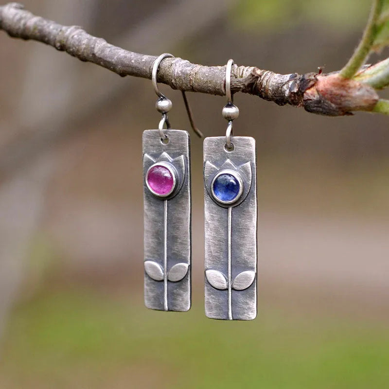 Antique finish geometric earrings with red sapphire stones on electroplated metal