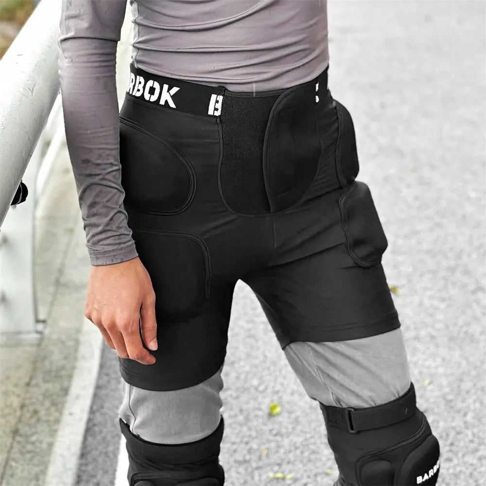 Black sports hip protector with NBR foam padding on spandex base for skating and skiing safety