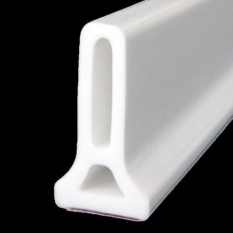 Flexible TPE silicone bathroom water blocking strip in black colour showing 30x40cm size for shower room floor water containment