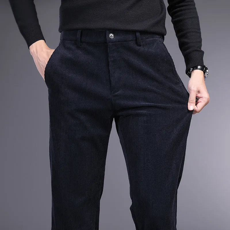 British retro striped straight-leg trousers in a chemical fibre blend, showing zip placket detail.