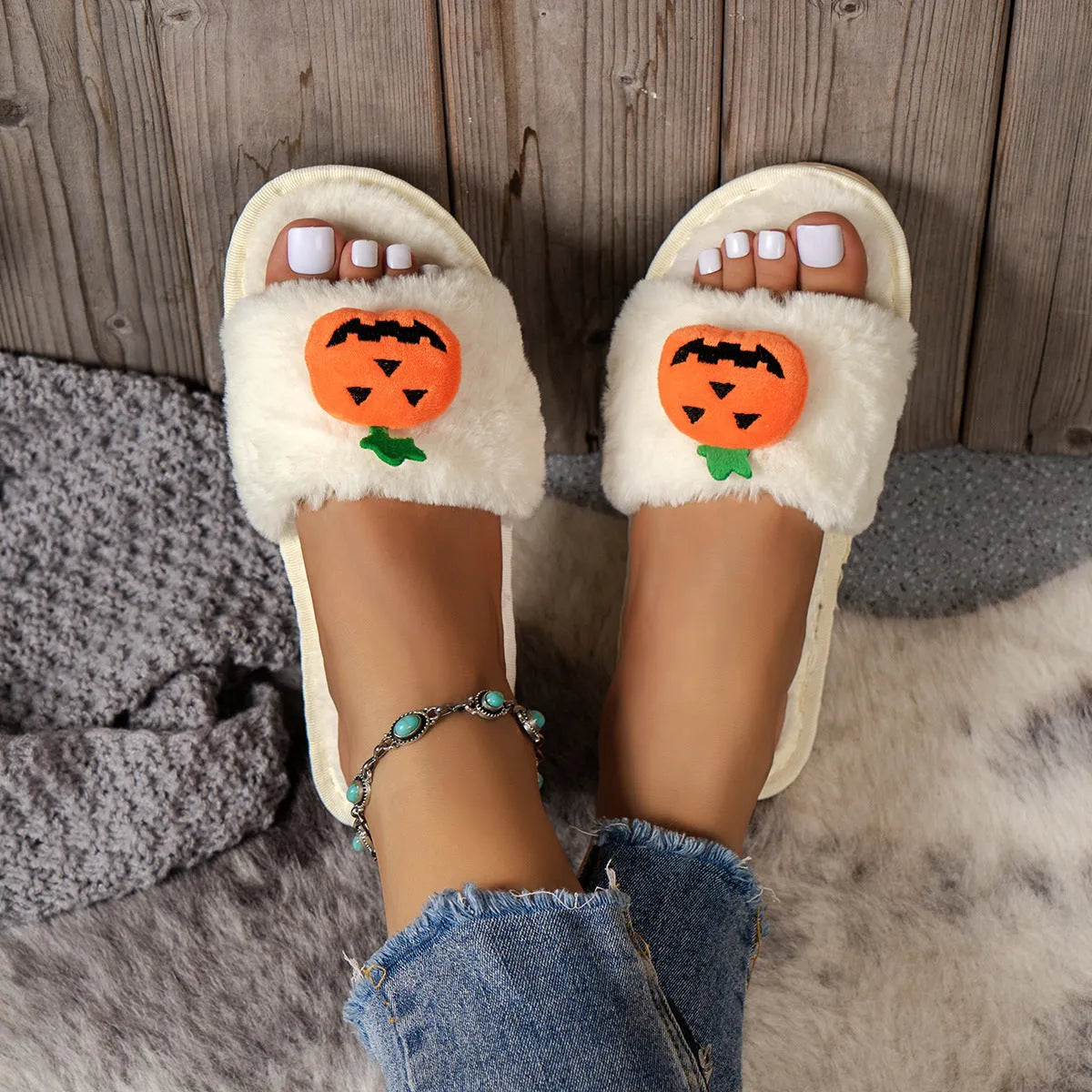 Yellow pumpkin cartoon plush slippers with synthetic fur upper and PVC sole, open toe design.
